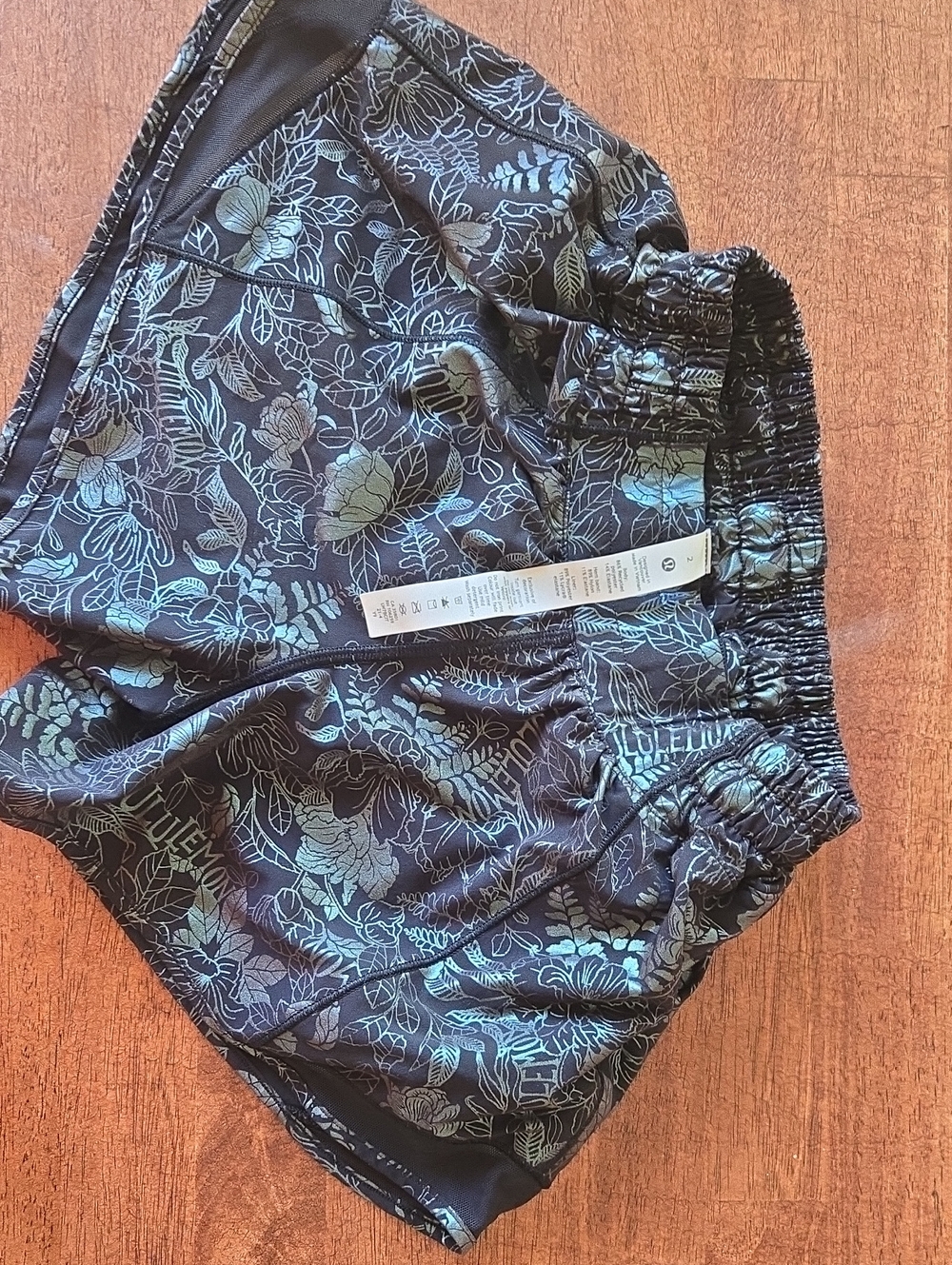 lululemon athletica Kids' Black Shorts with Shiny Teal Floral Print